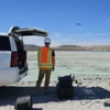 A researcher uses a drone to investigate mine tailings