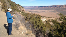Isabel Barton overlooks a mine on the Utah-Colorado border.