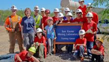 Pam Wilkinson, standing second from left, with visitors to the UA San Xavier Underground Mining Lab, the nation's largest student-run underground mine.