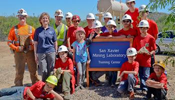 Pam Wilkinson, standing second from left, with visitors to the UA San Xavier Underground Mining Lab, the nation's largest student-run underground mine.